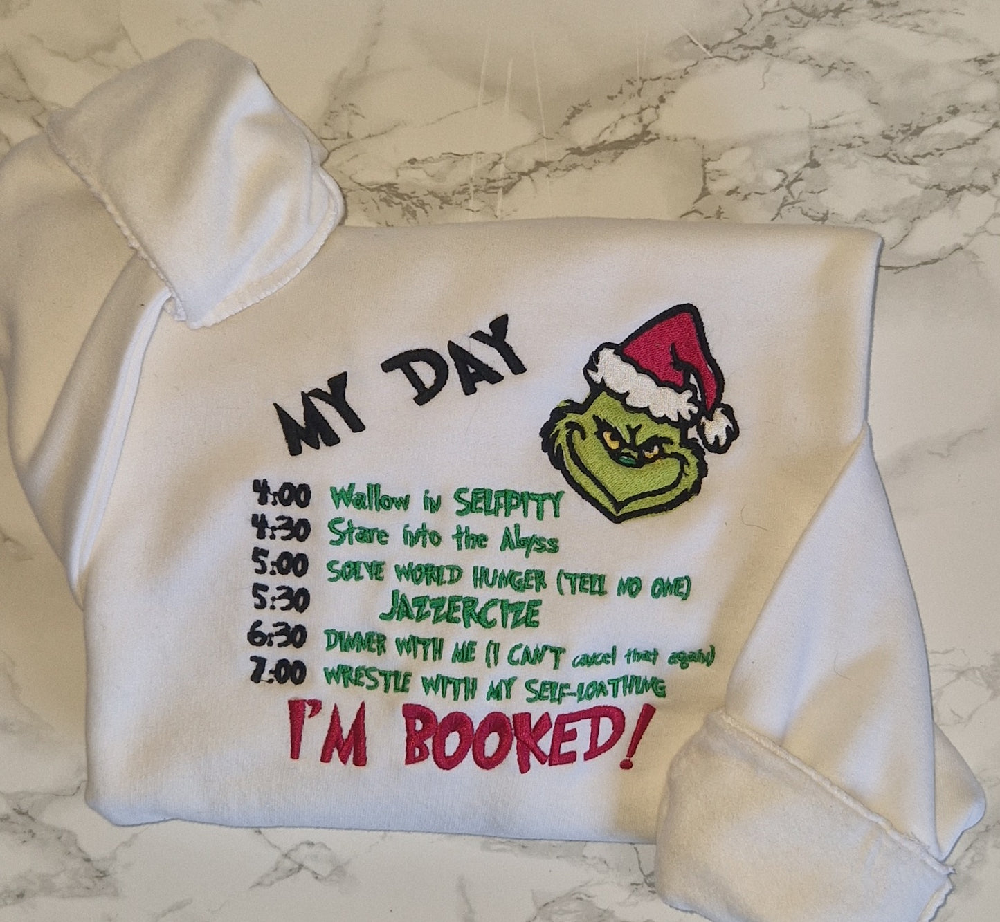 White Grinch 'Im booked' embroidered sweatshirt